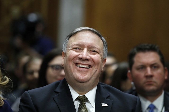 CIA Director Mike Pompeo, picked to be the next secretary of state, laughs at a joke while he is introduced before the Senate Foreign Relations Committee during a confirmation hearing on his nomination to be Secretary of State, Thursday, April 12, 2018 on Capitol Hill in Washington. Pompeo's remarks will be the first chance for lawmakers and the public to hear directly from the former Kansas congressman about his approach to diplomacy and the role of the State Department, should he be confirmed to lead it. (AP Photo/Jacquelyn Martin)

