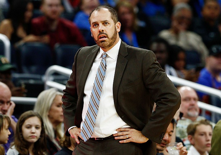 Orlando Magic head coach Frank Vogel, in this Dec. 15, 2017, file photo, waits for an official’s explanation on a foul during the an NBA basketball game in Orlando, Fla. The Orlando Magic have fired Frank Vogel after two seasons. (AP Photo/Reinhold Matay, File)