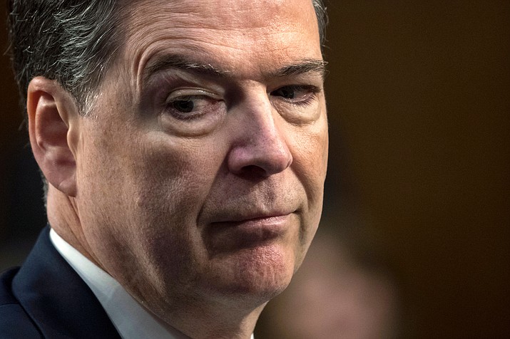In this June 8, 2017, file photo, former FBI director James Comey testifies before the Senate Select Committee on Intelligence, on Capitol Hill in Washington. Comey blasts President Donald Trump as unethical and “untethered to truth” and his leadership of the country as “transactional, ego driven and about personal loyalty.” Comey’s comments come in a new book in which he casts Trump as a mafia boss-like figure who sought to blur the line between law enforcement and politics and tried to pressure him regarding the investigation into Russian election interference. (AP Photo/J. Scott Applewhite)

