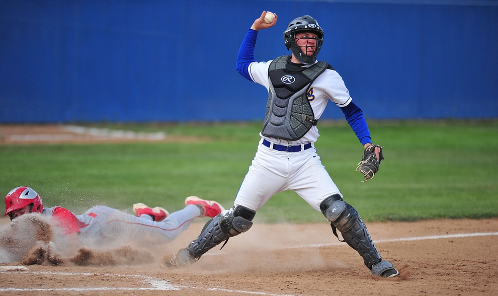 Prescott's Chase Kasun turns the double play from home as the Badgers face the Mingus Marauders Monday, April 16, 2018 in Prescott. (Les Stukenberg/Courier)