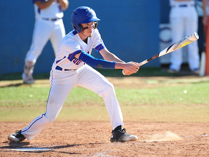 Chino Valley’s Kaleb Chacon singles as the Cougars host the Kingman Bulldogs on Tuesday, April 17, 2018, in Chino Valley. (Les Stukenberg/Courier)