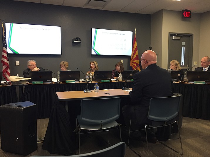 Dr. Clint Ewell, Yavapai College’s vice president of finance and administrative services, presents details about a proposed 2 percent property tax increase to the college’s district governing board on Tuesday, April 17, 2018. (Max Efrein/Courier)