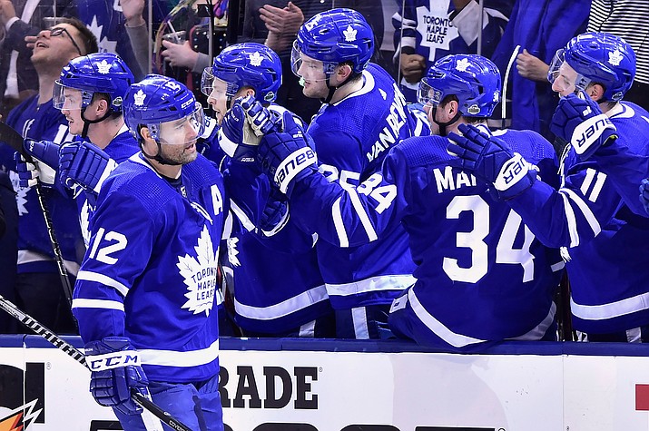 Toronto Maple Leafs centre Patrick Marleau (12) celebrates his goal against the Boston Bruins during third period NHL round one playoff hockey action in Toronto on Monday, April 16, 2018. (Frank Gunn/The Canadian Press, via AP)