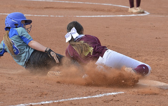 Lady Bulldog Macee Rae Cunningham tags out a Snowflake  player in an April 10 game. The Lady Bulldogs are 14-6 after recent wins. (Todd Roth/NHO)