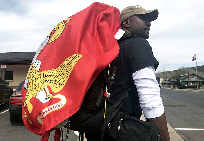 Retired Marine Roy Wesley Brady Jr. stopped in Williams on his second walk across the United States to raise awareness for wounded veterans. (Loretta Yerian/WGCN)