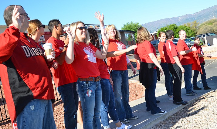 Teachers, staff and community members have a “walk in” Wednesday morning before school hours at Mingus Union High School to bring attention to the state of education in Arizona. VVN/Vyto Starinskas