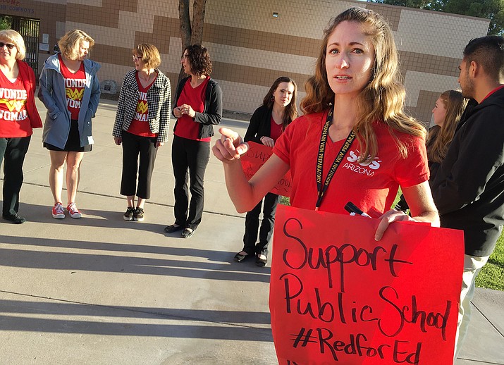 Camp Verde High School science teacher Katy Potter leads a group of the district’s educators in a walk-in at the high school. On Tuesday, Potter said that though the district’s teachers will participate in Thursday’s walkout, they will be back to work on Monday, April 30. VVN/Bill Helm