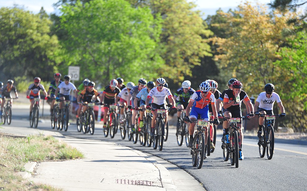 50-milers going uphill on Copper Basin Road during the Whiskey Off Road 30 and 50 mile amateur races in Prescott Saturday, April 28, 2018. (Les Stukenberg/Courier)