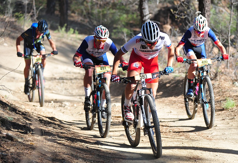 Brian Gordon leads Spencer Ciammitti and Grayson Hughes during the Whiskey Off Road 50 mile amateur race in Prescott Saturday, April 28, 2018. (Les Stukenberg/Courier)
