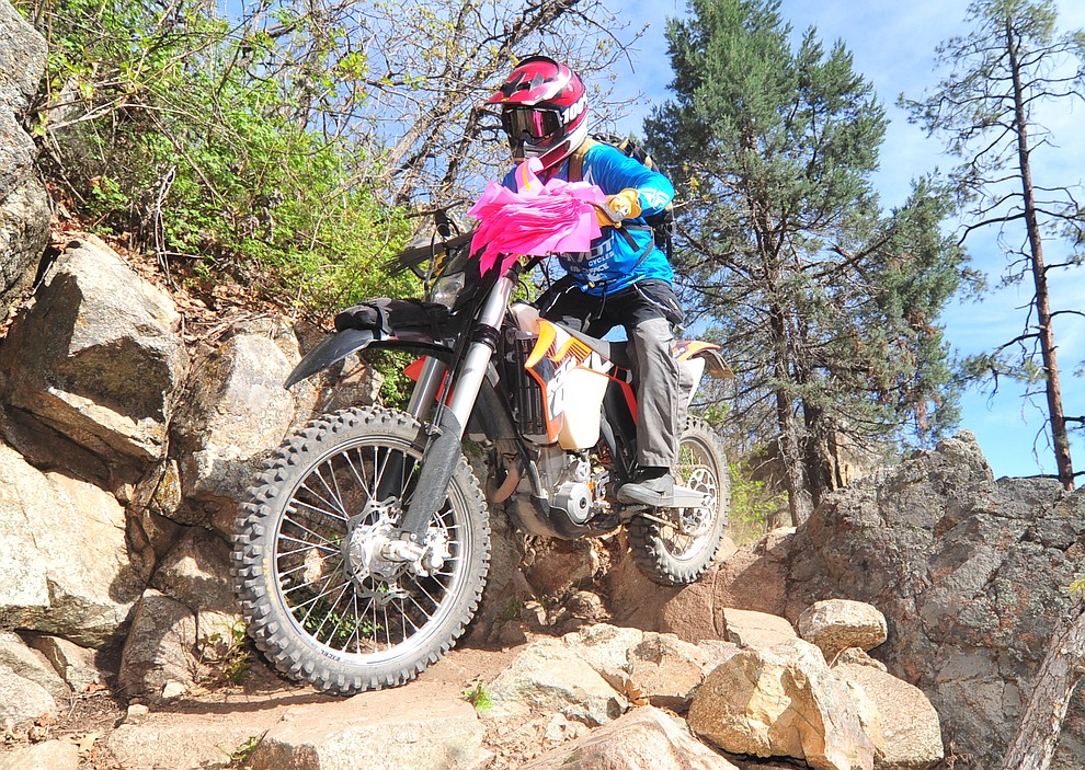 John Shumacher rides the lead moto for the women's race during the Whiskey Off Road 50 mile professional race in Prescott Sunday, April 29, 2018. (Les Stukenberg/Courier)