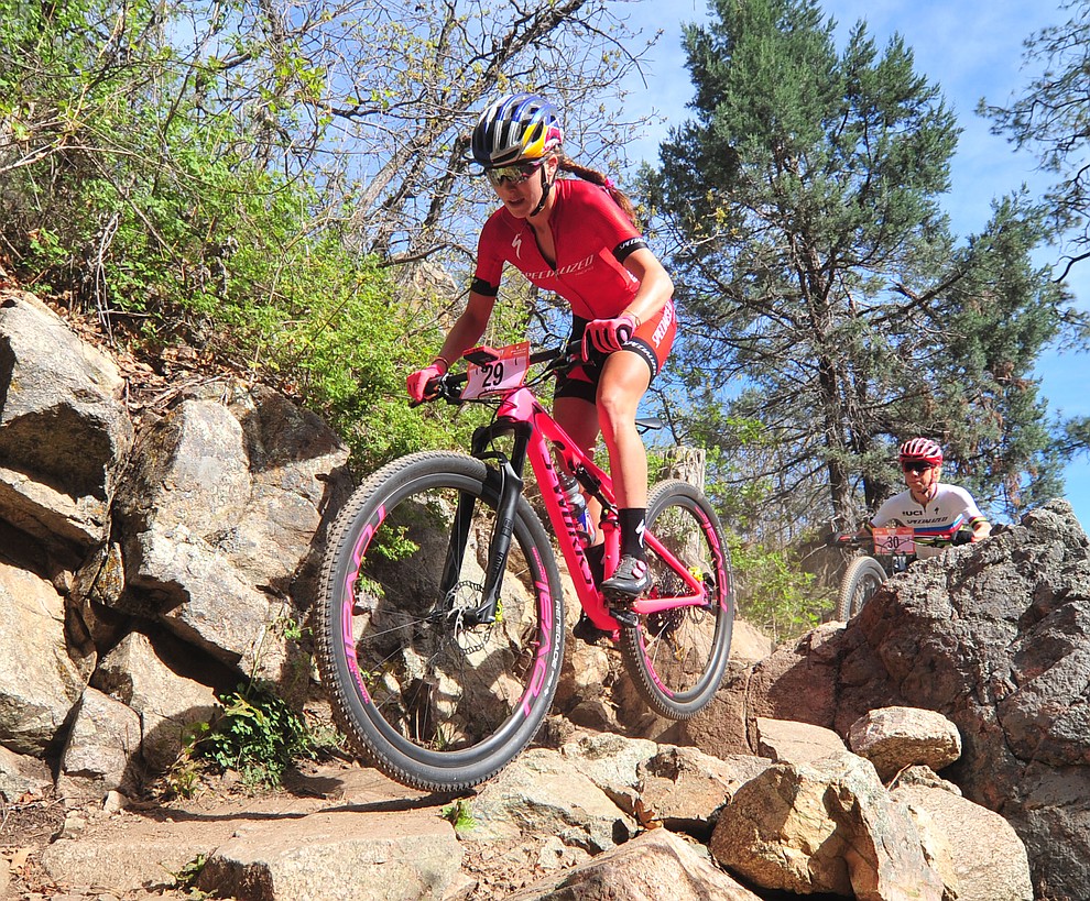 Kate Courtney goes through a technical section on trail 48 during the Whiskey Off Road 50 mile professional race in Prescott Sunday, April 29, 2018. (Les Stukenberg/Courier)