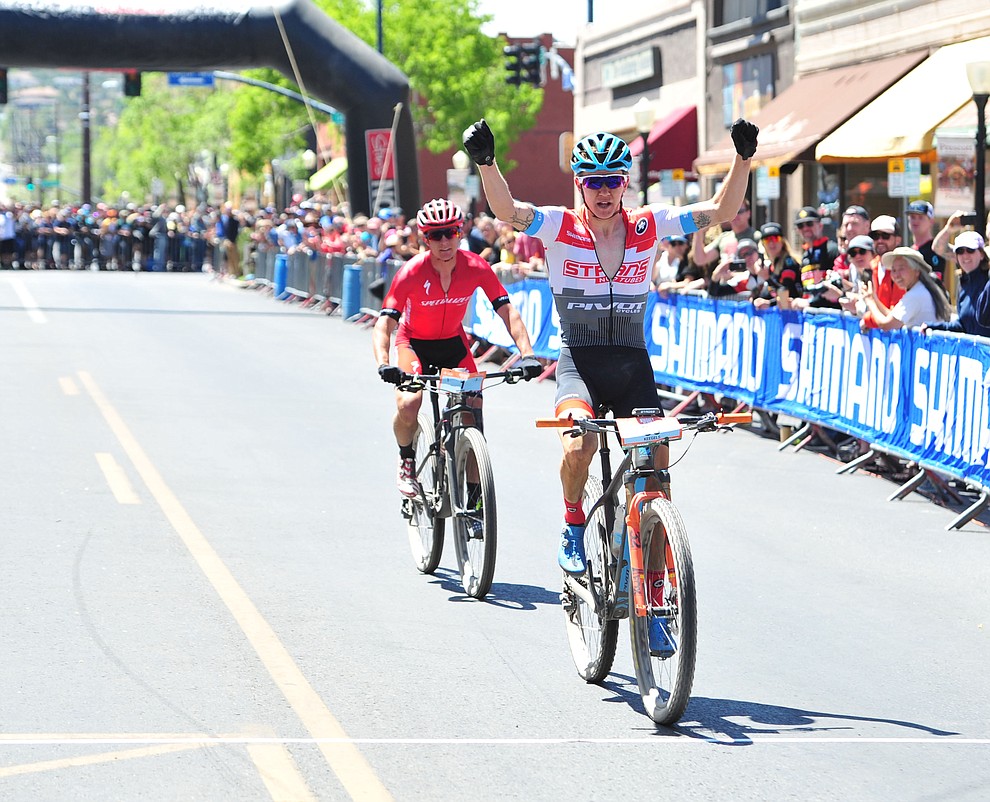 Keegan Swenson beats Howard Grotts by less than a bike length to win the Whiskey Off Road 50 mile professional race in Prescott Sunday, April 29, 2018. (Les Stukenberg/Courier)