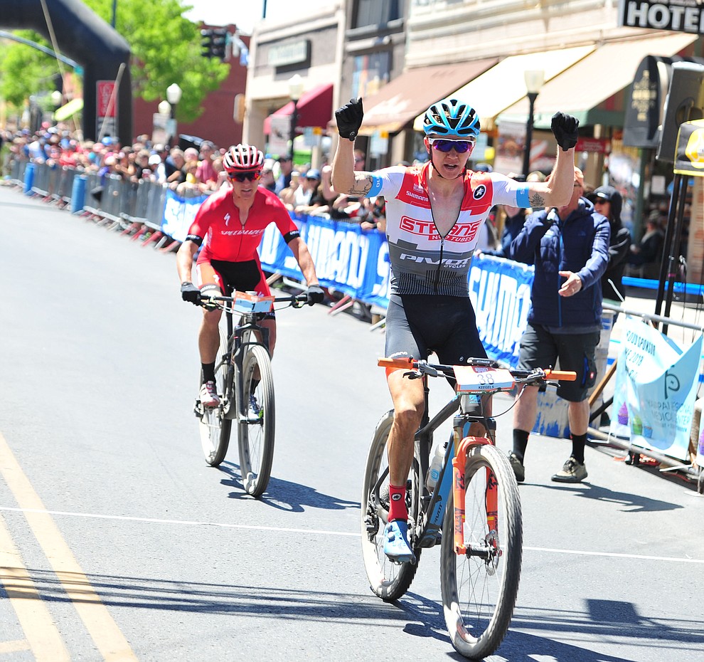 Keegan Swenson beats Howard Grotts by less than a bike length to win the Whiskey Off Road 50 mile professional race in Prescott Sunday, April 29, 2018. (Les Stukenberg/Courier)