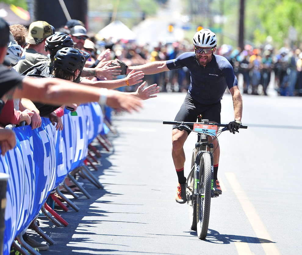 Ryan Standish took 6th place and showed his appreciation to the fans in the Whiskey Off Road 50 mile professional race in Prescott Sunday, April 29, 2018. (Les Stukenberg/Courier)