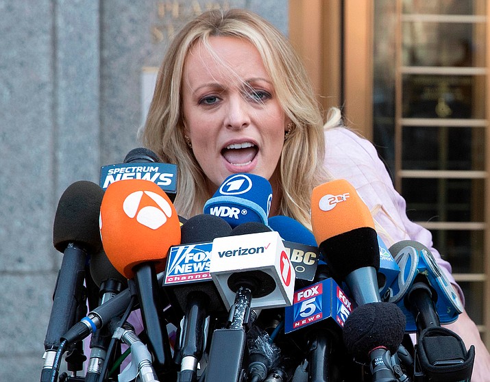 In this April 16, 2018 photo, adult film actress Stormy Daniels outside federal court in New York. Stormy Daniels filed a defamation complaint in federal court in New York on Monday. At issue is a tweet Trump made in which he dismissed a composite sketch that Daniels says depicts a man who threatened her in 2011 to stay quiet about her alleged sexual encounter with Trump. (AP Photo/Mary Altaffer)

