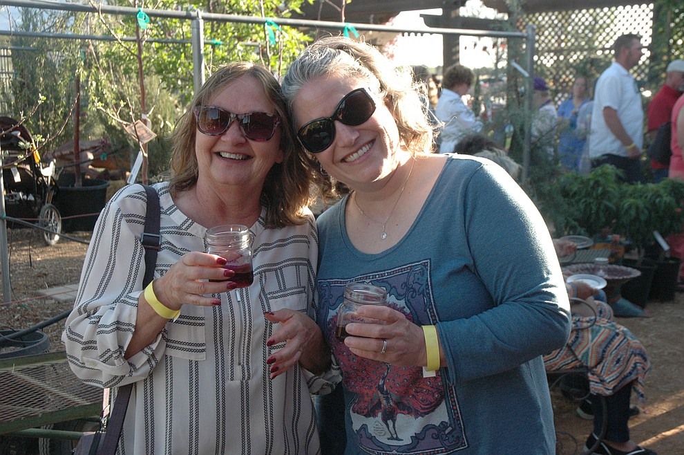 Kandi Donahoe and Andrea Davis at Wine, Bites & Brew held at Earthworks Garden Supply in Chino Valley Saturday, April 28. (Jason Wheeler/Courier)