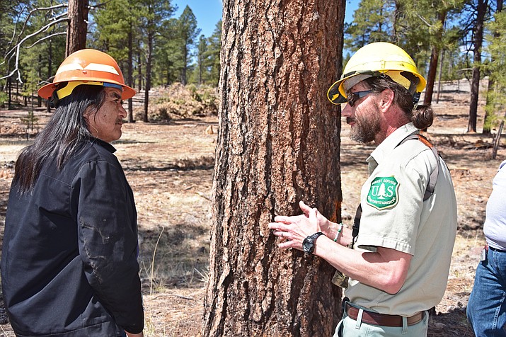 Kaibab National Forest biologist Justin Schofer meets with a Hopi tribal member April 6. (USFS/Kaibab National Forest)