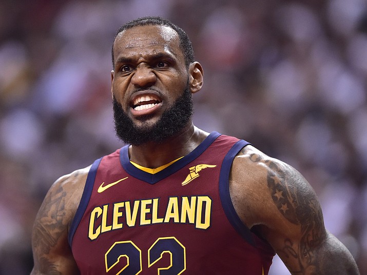 Cleveland Cavaliers forward LeBron James has words for the referees during the first half of Game 2 of an NBA basketball playoffs second-round series against the Toronto Raptors on Thursday, May 3, 2018, in Toronto. (Frank Gunn/The Canadian Press via AP)

