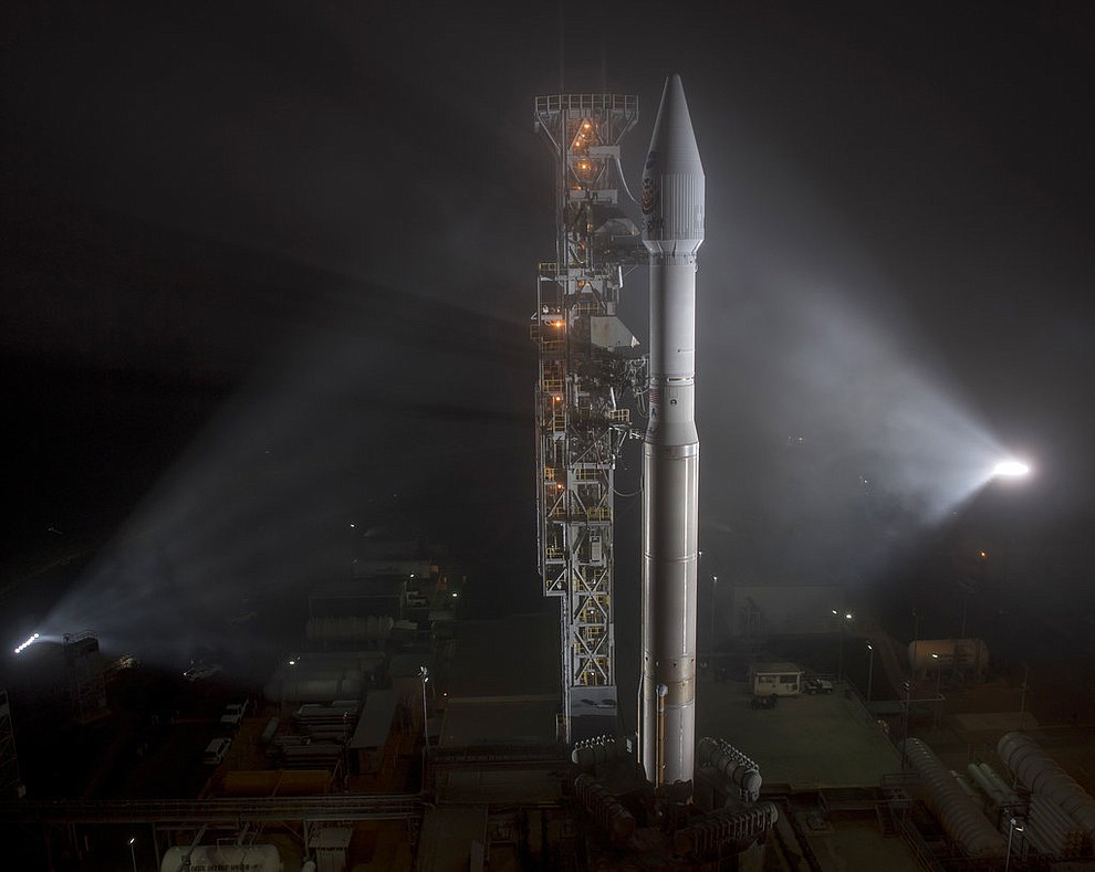 This photo released by NASA shows a United Launch Alliance (ULA) Atlas-V rocket with NASA's InSight spacecraft onboard shortly after the mobile service tower was rolled back, Friday, May 4, 2018, at Vandenberg Air Force Base in Calif. The rocket is set to launch early Saturday. (Bill Ingalls via AP)