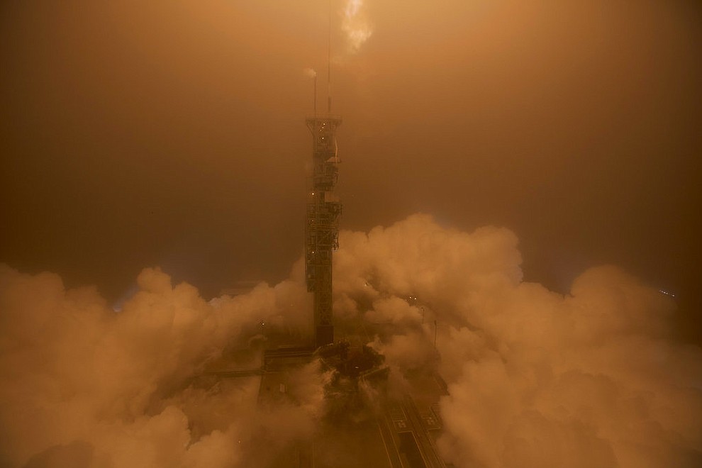 This image provided by NASA, InSight spacecraft launches onboard a United Launch Alliance Atlas-V rocket, Saturday, May 5, 2018, from Vandenberg Air Force Base, Calif. InSight, short for Interior Exploration using Seismic Investigations, Geodesy and Heat Transport, is a Mars lander designed to study the "inner space" of Mars. (Bill Ingalls/NASA via AP)
