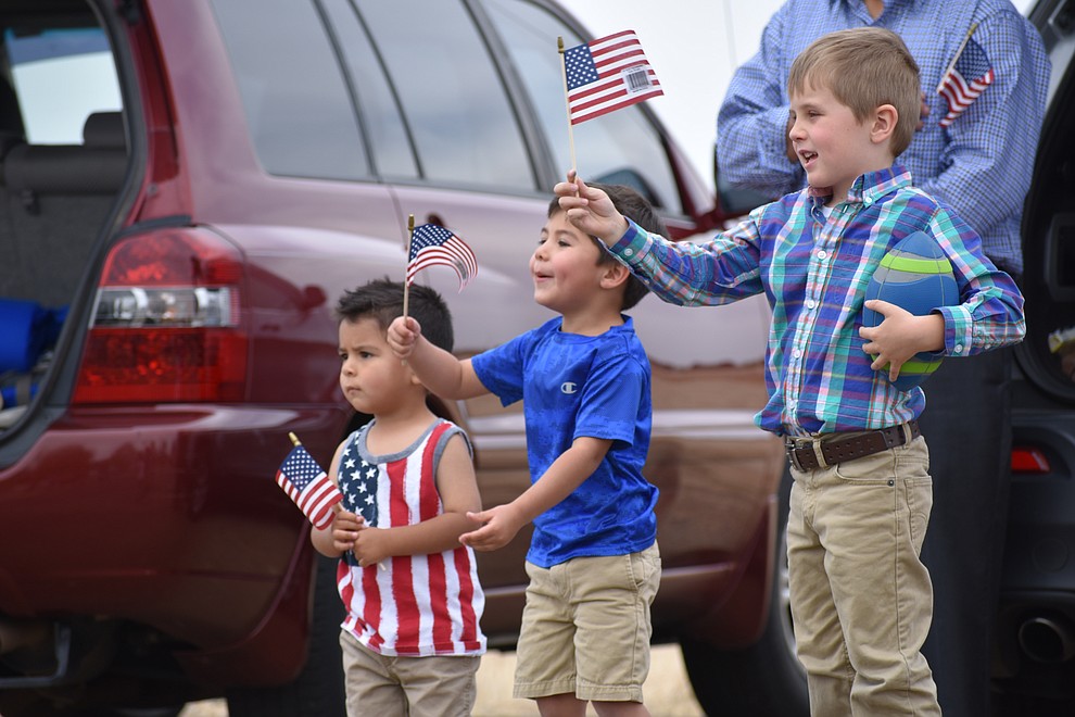 Military families and other members of the public cheer on National Guard Infantry Unit Charlie Company 1st Battalion-158 as they parade around the Civic Center in Prescott Valley on Sunday, May 6, 2018 in anticipation of their deployment to Afghanistan. (Richard Haddad/WNI)