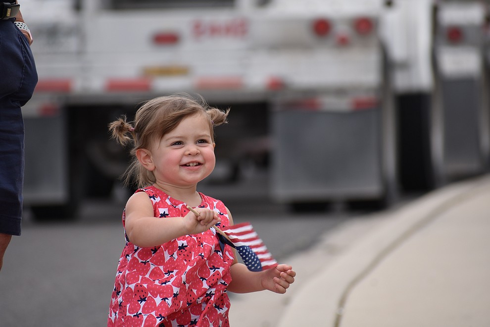 Military families and other members of the public cheer on National Guard Infantry Unit Charlie Company 1st Battalion-158 as they parade around the Civic Center in Prescott Valley on Sunday, May 6, 2018 in anticipation of their deployment to Afghanistan. (Richard Haddad/WNI)