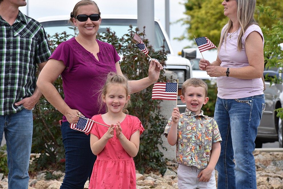 Military families and other members of the public cheer on National Guard Infantry Unit Charlie Company 1st Battalion-158 as they parade around the Civic Center in Prescott Valley on Sunday, May 6, 2018 in anticipation of their deployment to Afghanistan. (Richard Haddad/WNI)