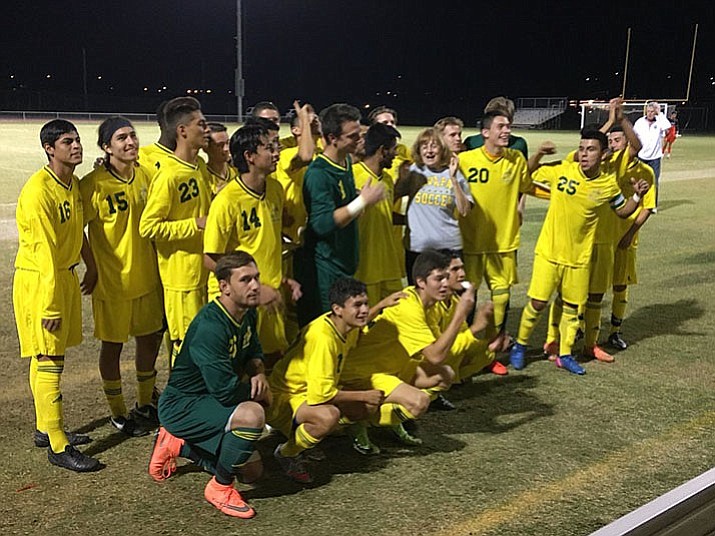 In this file photo, the Yavapai College men's soccer team poses for a photo after defeating No. 1-seeded Pima 2-1 in the NJCAA Region I championship Oct. 28, 2017, in Tucson.  The college is looking into how much it will cost to build a $1.9 million multi-purpose field on its Prescott campus. The field would provide a home space for the soccer team, as well as serve as a space for other large college and community events, such as graduation.