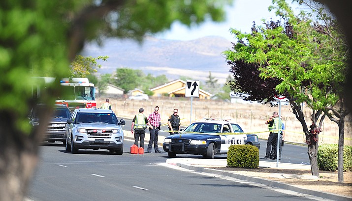 Prescott Valley Police investigate a vehicle versus pedestrian collision in the intersection of Lake Valley Road and Lakeshore Drive Monday, May 7, 2018. (Les Stukenberg/Courier)