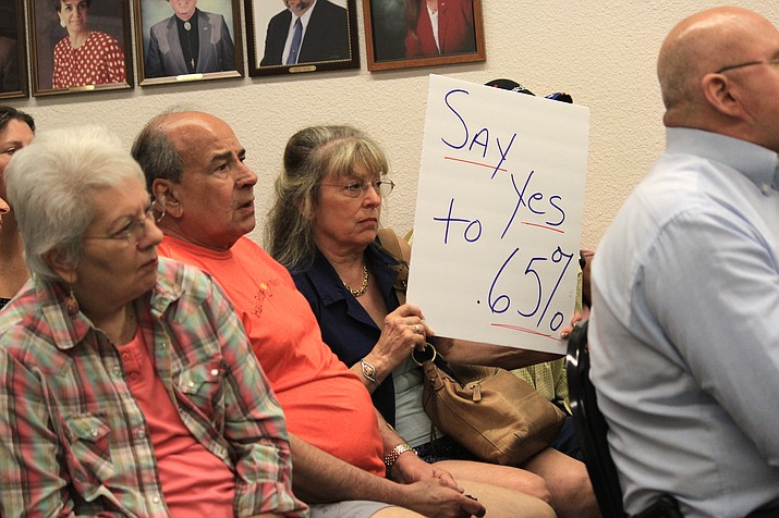 In an unusual move for citizens, many attended Cottonwood’s work session Tuesday with signs advocating for a .65 percent sales tax increase. VVN/Kelcie Grega