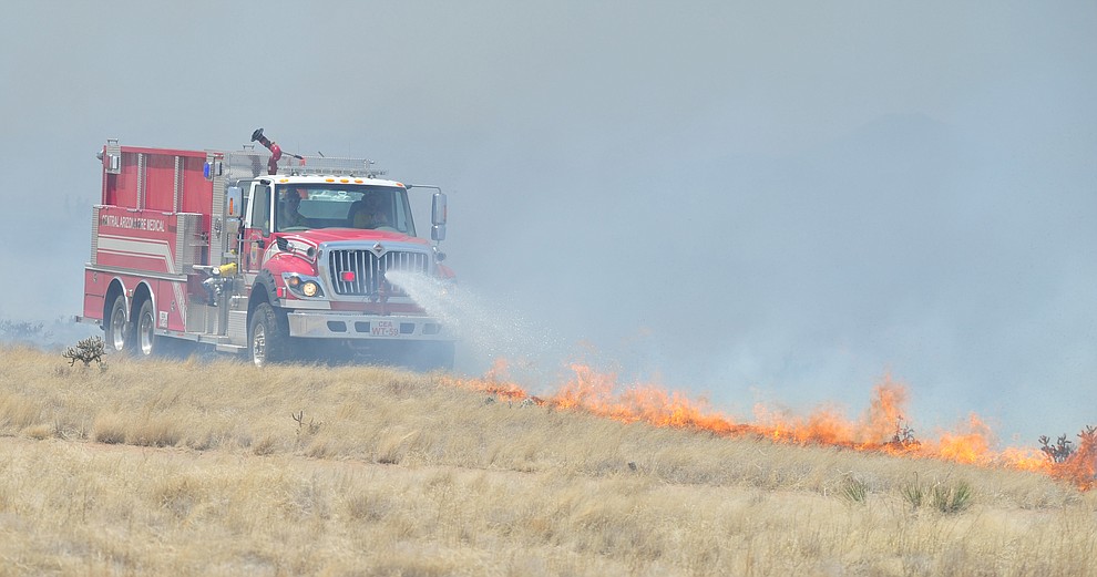 The Viewpoint Fire started along Highway 89A in Prescott Valley Friday morning, May 11, 2018. The fire, driven by a sustained wind, headed north into the Poquito Valley area. (Les Stukenberg/Courier)