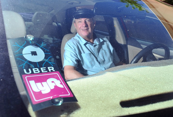 Charles Hail, an Uber and Lyft driver, says he hasn’t had a bad customer yet in his short time driving for the transportation services. (Les Stukenberg/Courier)