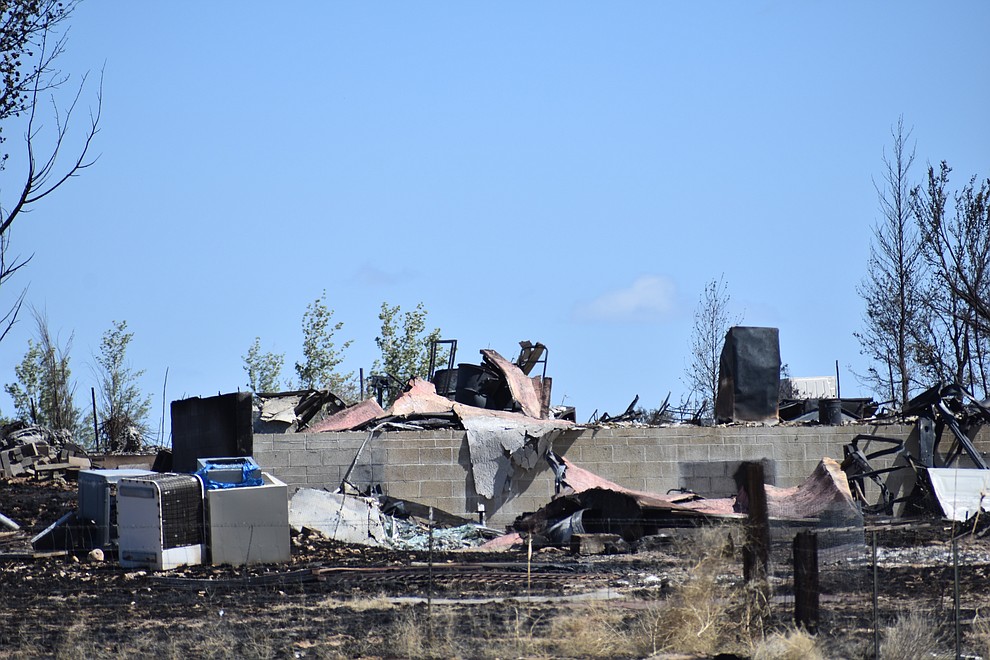 On the morning of May 12, 2018 residents woke up to survey damage to homes and property caused by the Viewpoint Fire in the Poquito Valley area of Prescott Valley, Arizona. (Richard Haddad/WNI)
