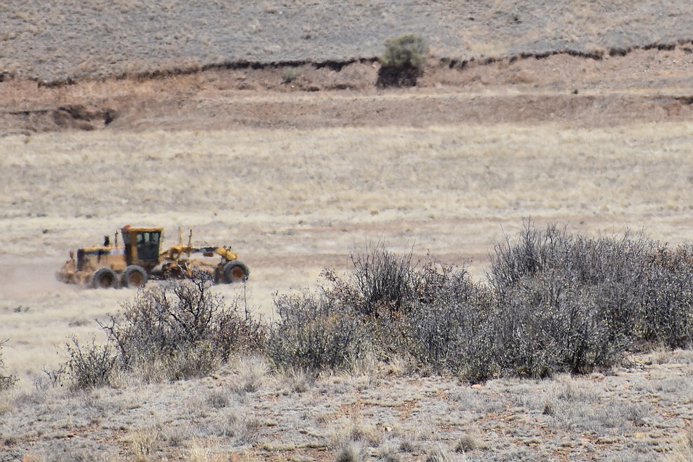Heavy equipment was brought in to dig a firebreak to help stop a wildland fire along Fain Road in Prescott Valley Monday, May 14, 2018. The fire, which began near the intersection of Fain Road and Lakeshore Drive around 10 a.m. (Richard Haddad/WNI)