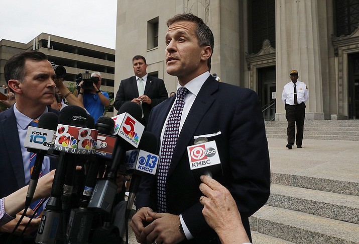 Missouri Gov. Eric Greitens addresses the media on the steps of the Civil Court building on Monday, May 14, 2018, after the case against him was dismissed. Greitens declared victory Monday as prosecutors abruptly dropped a felony invasion-of-privacy charge alleging he had taken a revealing photo of a woman with whom he has acknowledged having an affair. (J.B. Forbes/St. Louis Post-Dispatch via AP)

