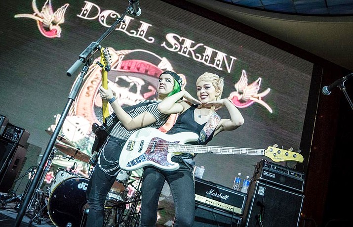 From left, Sydney Dolezal and Nicole Rich of Doll Skin ham it up on stage. (Courtesy)