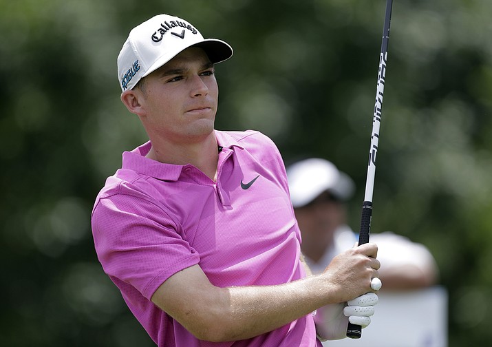 Aaron Wise follows his shot off the eighth tee during the third round of the AT&T Byron Nelson golf tournament, Saturday, May 19, 2018, in Dallas, Texas. (Eric Gay/AP)