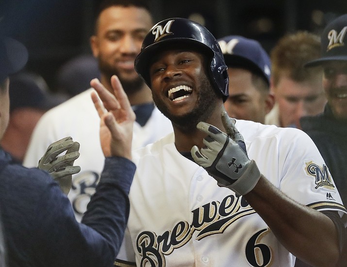 Milwaukee Brewers’ Lorenzo Cain celebrates after hitting a home run during the sixth inning of a baseball game against the Arizona Diamondbacks Monday, May 21, 2018, in Milwaukee. (AP Photo/Morry Gash)