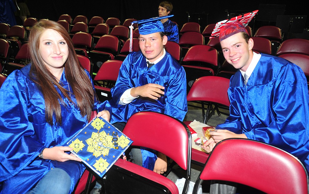 Ashley Schuck, Greg Sallee and Braydon Duey before the Chino Valley Commencement held Wednesday, May 23, 2018 at the Prescott Valley Event Center. (Les Stukenberg/Courier)