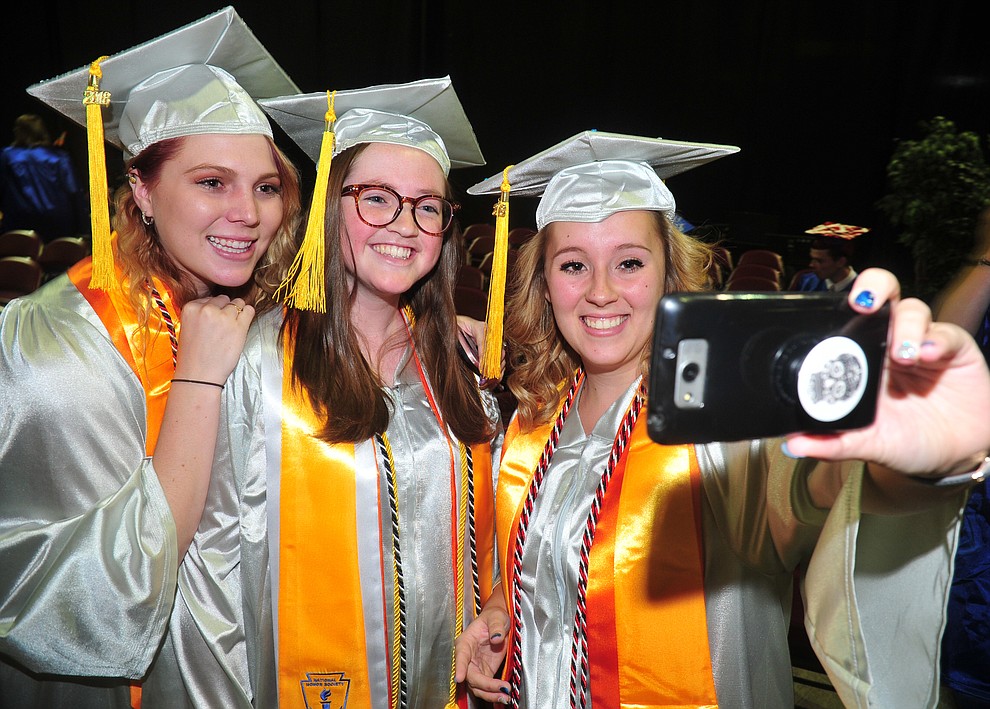 Lauren Joseph, Alexis Mastin and Sophia Davis-Babb take a selfie before the Chino Valley Commencement held Wednesday, May 23, 2018 at the Prescott Valley Event Center. (Les Stukenberg/Courier)