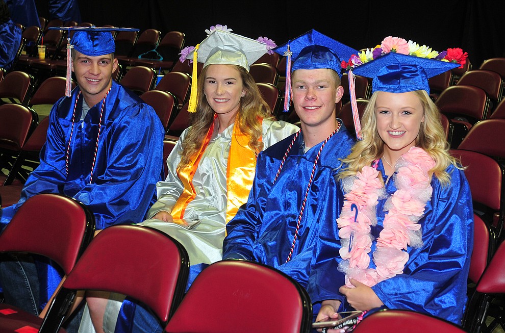 Tyler Hixson, Keigan Willingham, Zach Paris and Madilyn Lawrence before the Chino Valley Commencement held Wednesday, May 23, 2018 at the Prescott Valley Event Center. (Les Stukenberg/Courier)