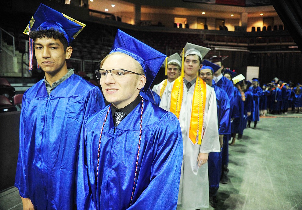 Walking in the processional at the Chino Valley Commencement held Wednesday, May 23, 2018 at the Prescott Valley Event Center. (Les Stukenberg/Courier)