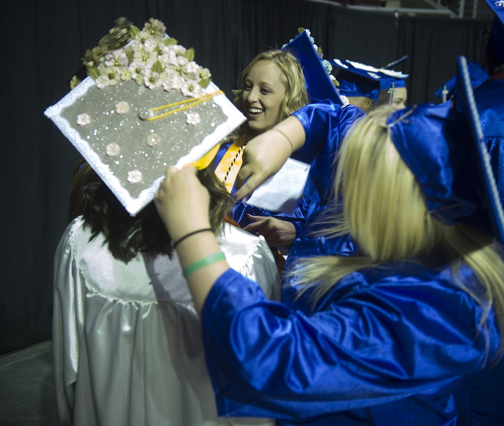 Final adjustments before the Chino Valley Commencement held Wednesday, May 23, 2018 at the Prescott Valley Event Center. (Les Stukenberg/Courier)
