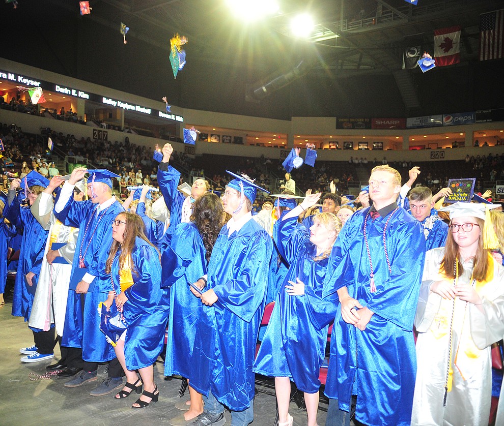 Mortar boards skyward at the Chino Valley Commencement held Wednesday, May 23, 2018 at the Prescott Valley Event Center. (Les Stukenberg/Courier)