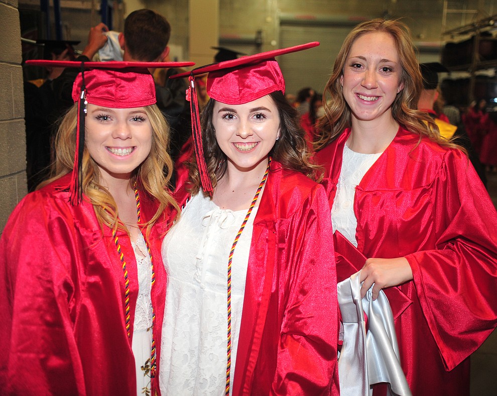 Logn Land, Meghan Cain aand Cecilia Depue pose before the 2018 Bradshaw Mountain High School Commencement Ceremony at the Prescott Valley Event Center Thursday, May 24, 2018. (Les Stukenberg/Courier)