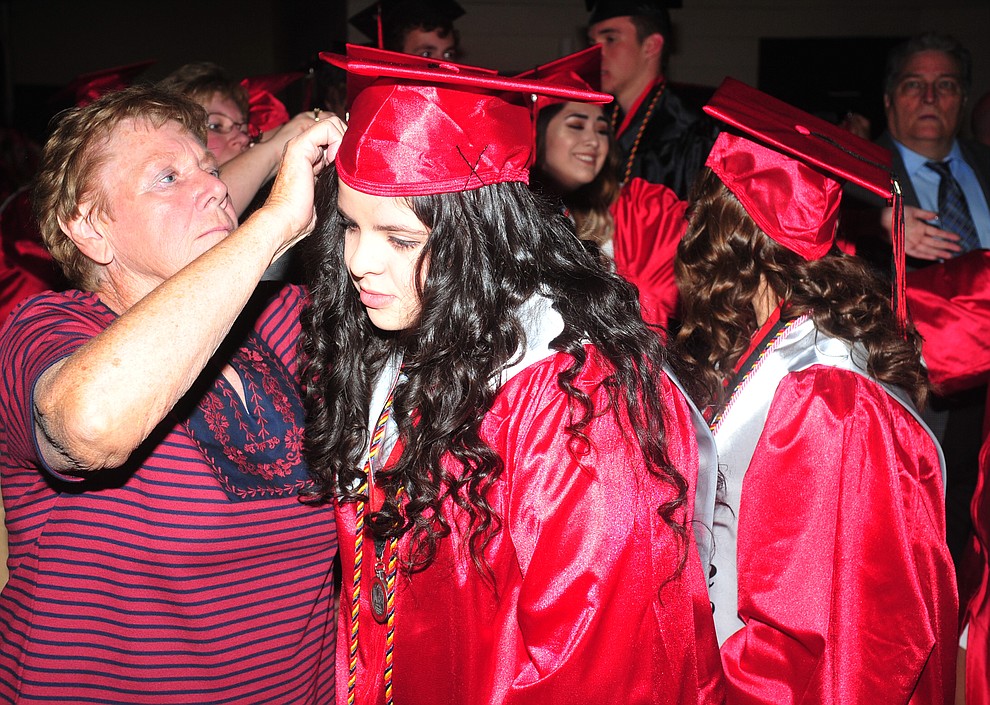 Alexis Perez gets her hair fixed before the 2018 Bradshaw Mountain High School Commencement Ceremony at the Prescott Valley Event Center Thursday, May 24, 2018. (Les Stukenberg/Courier)