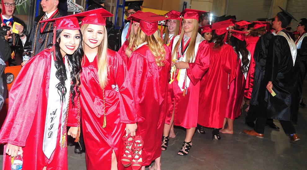 Adriana Calderon and Bailey Leigh pose before the 2018 Bradshaw Mountain High School Commencement Ceremony at the Prescott Valley Event Center Thursday, May 24, 2018. (Les Stukenberg/Courier)