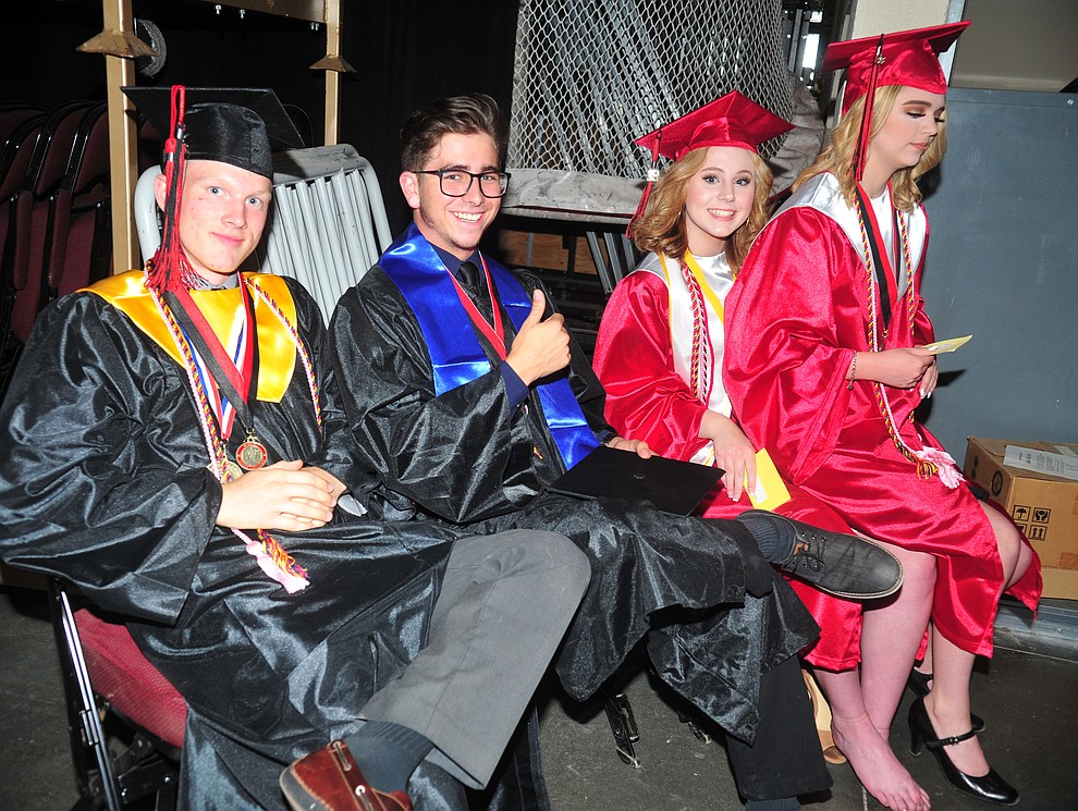 Hyrum Hale, Dillon Jones, Isabella Beilfuss, and Rachael Suchy relax before the 2018 Bradshaw Mountain High School Commencement Ceremony at the Prescott Valley Event Center Thursday, May 24, 2018. (Les Stukenberg/Courier)