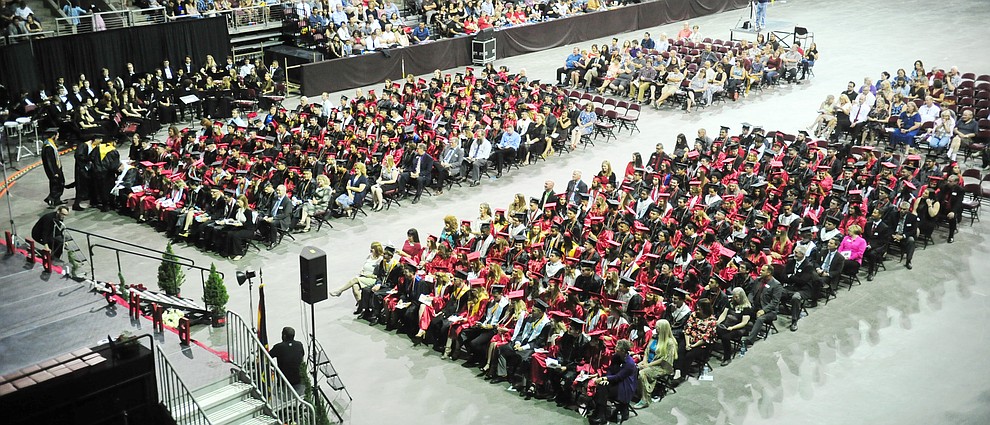 Soon to be graduates listen to a speaker during the 2018 Bradshaw Mountain High School Commencement Ceremony at the Prescott Valley Event Center Thursday, May 24, 2018. (Les Stukenberg/Courier)
