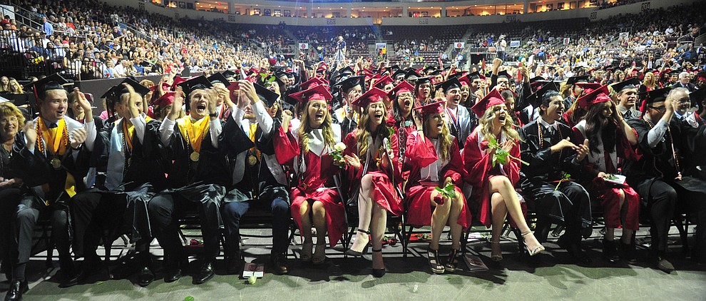Graduates cheer the final diploma being awarded during the 2018 Bradshaw Mountain High School Commencement Ceremony at the Prescott Valley Event Center Thursday, May 24, 2018. (Les Stukenberg/Courier)